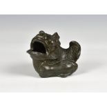 A European bronze censer in the form of an adult carp with a young carp mark beneath "JUSL" within a