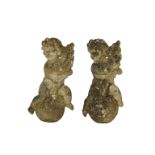 A pair of composite stone Putti