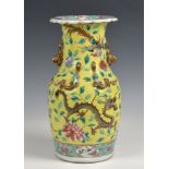 A 19th century Chinese yellow ground vase decorated with four-clawed dragons, exotic birds and