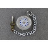 A Victorian silver cased ladies open faced fob watch hallmarked London 1886, the floral decorated,