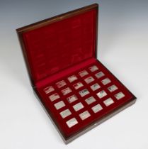 John Pinches - a boxed set of 25 silver ingots Elizabeth Our Queen Contained in wooden box, lined in