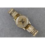 A vintage Zodiac gold plated triple calendar manual wind wrist watch c.1955, ref. 1202, the 29mm.