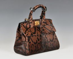 A Salvatore Ferragamo leopard print The Studio top handle tote bag the pony hide bag with leopard