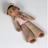 A stuffed Chad Valley cloth toy sailor given to the vendor on board HMS Nelson when the battleship