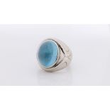 Leo de Vroomen - a platinum and cabochon aquamarine ring, and a pair of ear clips en suite the