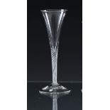 A mid-18th century airtwist wine flute c.1750, the drawn trumpet bowl on a tapering, multi spiral