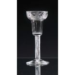 A mid-18th century pan topped airtwist wine glass c.1750, the rim engraved and slice cut with a