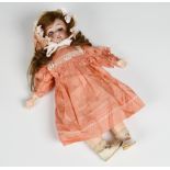 A small Simon & Halbig bisque head girl doll impressed marks '1849 Jutta S&H 3½' to back of the