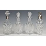 A pair of cut glass decanters