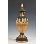 A ceramic gilt and dark green vase lamp