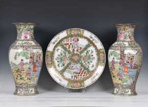 A pair of Chinese famille rose vases late 20th century, baluster form with everted rims, painted