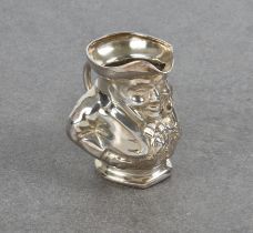 A novelty silver Toby Jug Hallmarks rubbed, possibly Birmingham, 1905, the jug having realistic