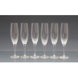 A set of six cut crystal champagne flutes