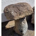 A Guernsey granite mushroom the base approximately 17 inches in height, plus cap of approximately 17