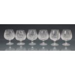 A set of six cut glass brandy balloons