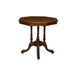 A late Victorian inlaid walnut octagonal occasional table the inlaid top with moulded edge over four