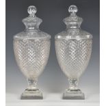 A good pair of large, Georgian style cut glass covered urns