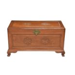 A 20th century camphorwood chest decorated with carved Shou symbols to front and top, with an