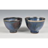 Studio Pottery, a pair of blue glazed ceramic footed bowls with silvered rims