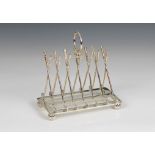 Golfing Interest: An EPNS novelty seven-bar toast rack, each bar as crossed golf clubs, plain