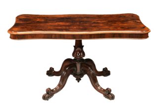 A Victorian serpentine rosewood centre table