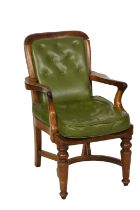A mahogany green leather button back open arm chair