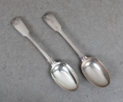 Channel Islands interest - A pair of Victorian shell backed fiddle pattern silver table spoons