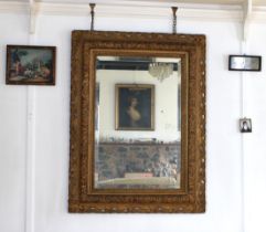 A Victorian gilt and composition mirror