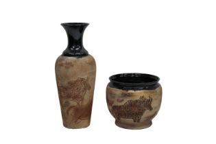 A modern cave painting jardinière and floor standing vase