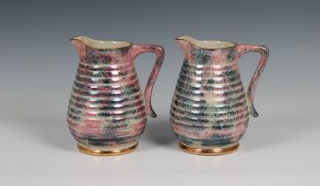 A pair of 20th century Govancroft, Glasgow pottery lustre jugs