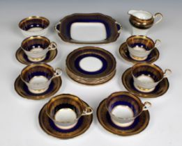 An elegant cobalt blue and gilded Aynsley part tea service