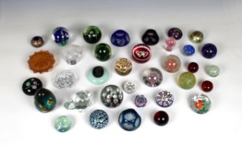 A collection of glass paperweights