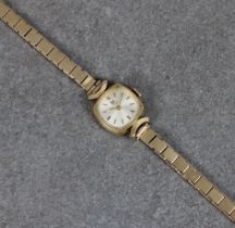 A ladies gold Tissot wrist watch