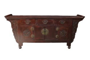 A Chinese hardwood low chest