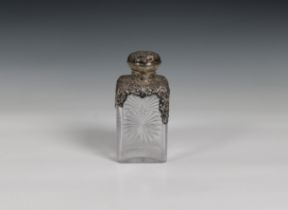 A Victorian cut glass scent bottle with silver mounts