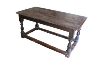 An 18th century style oak centre table