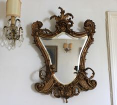 19th century gilt and composition girandole mirror, cartouche form