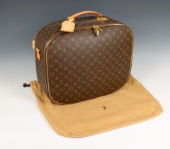 A Louis Vuitton monogrammed travel case