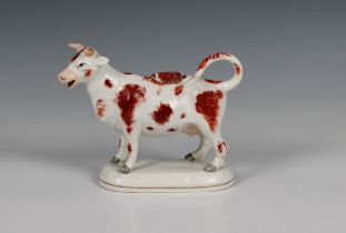 A 19th century Staffordshire ceramic cow creamer