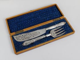 A Victorian silver serving knife and fork