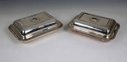 A pair of Georgian silver entrée dishes