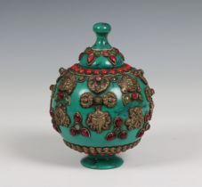 A Tibetan green lacquered wooden jar and cover