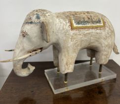 A 19th century Kashmiri carved wood elephant