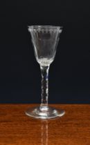 A fine 18th century fluted, engraved and facet cut wine glass