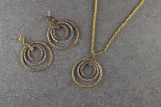 A suite - 9ct tri-colour gold pendant necklace and earring set
