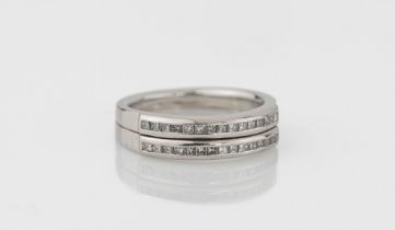 A Catherine Best platinum and diamond two row half eternity ring channel set with princess cut diamo