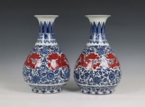 A pair of Chinese blue & white baluster vases