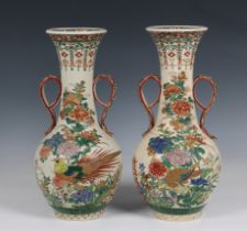 A pair of Japanese style two handled baluster vases