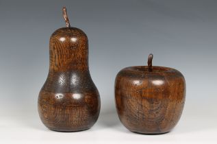 A carved stained oak pear and apple