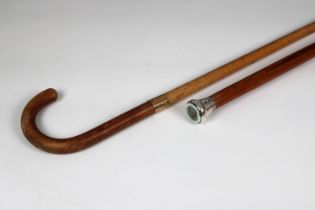 A Columbian pine walking cane the finial set with enamel Jersey penny (1/12 of a Shilling)